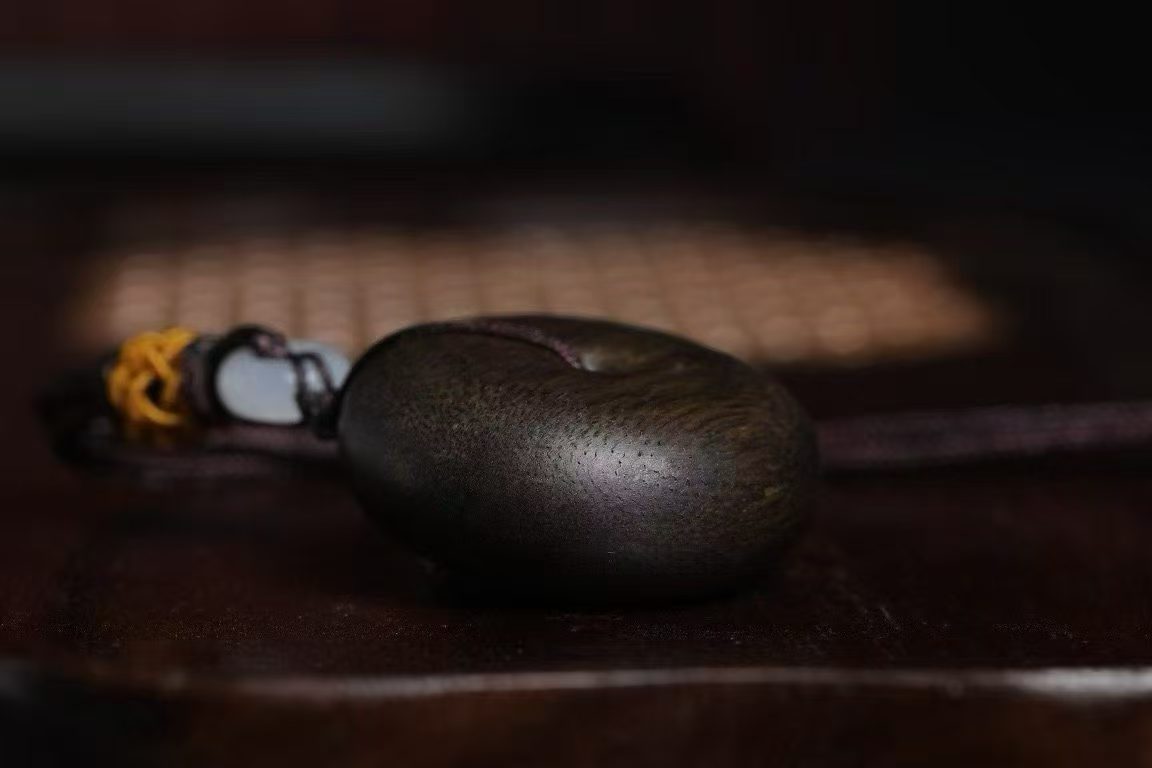 Brunei agarwood pendant detail