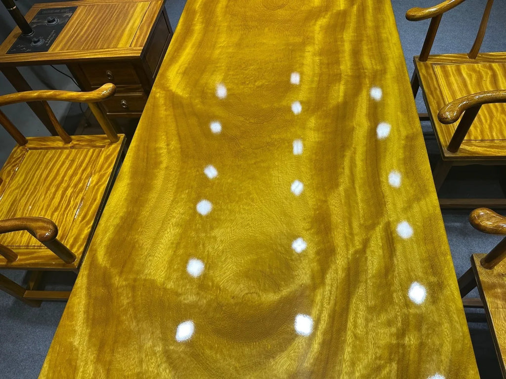 Golden-thread Nanmu Solid Golden Nanmu wood table (suitable for tea ceremonies, dining, or coffee) — crafted from solid wood and featuring a stainless steel base.