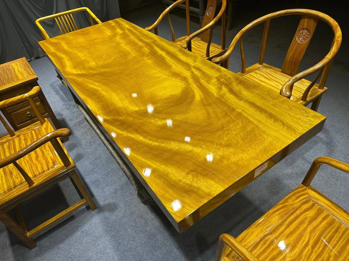 Golden-thread Nanmu Solid Golden Nanmu wood table (suitable for tea ceremonies, dining, or coffee) — crafted from solid wood and featuring a stainless steel base.