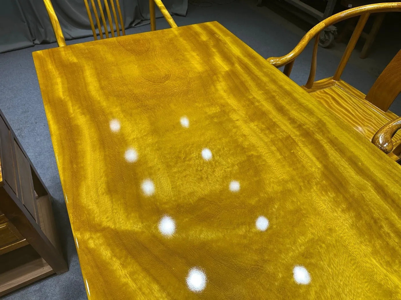 Golden-thread Nanmu Solid Golden Nanmu wood table (suitable for tea ceremonies, dining, or coffee) — crafted from solid wood and featuring a stainless steel base.