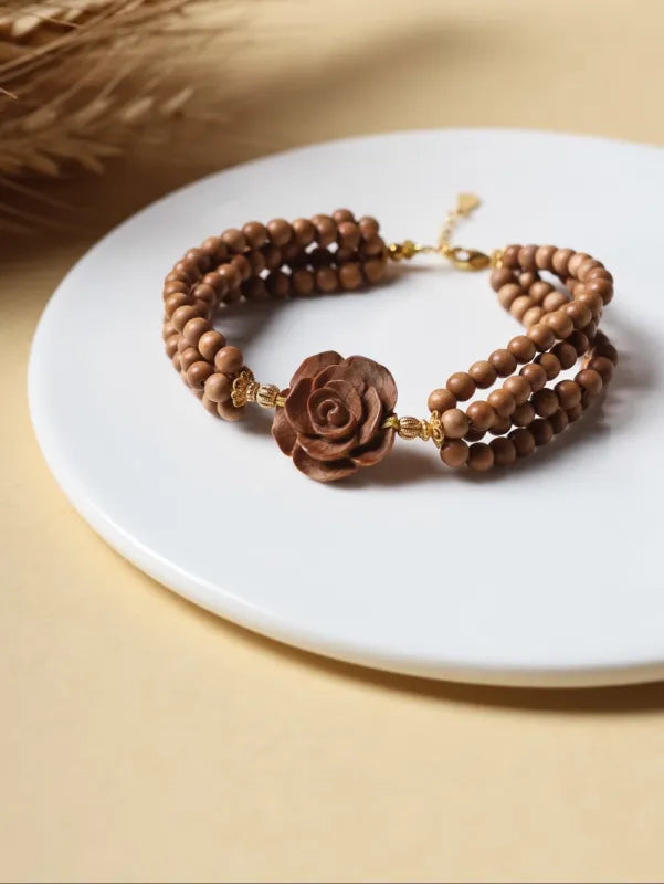 Sandalwood Rose Bracelet – Triple Strand Natural Wood Bead Bracelet with Carved Rose