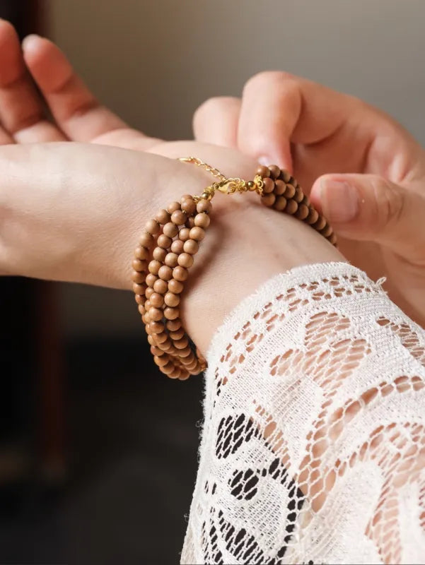 Sandalwood Rose Bracelet – Triple Strand Natural Wood Bead Bracelet with Carved Rose