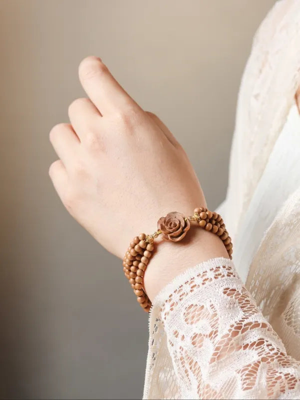 Sandalwood Rose Bracelet – Triple Strand Natural Wood Bead Bracelet with Carved Rose
