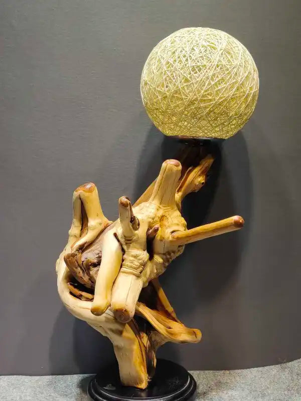 Cliff cypress root lamp close-up showing natural grain and texture