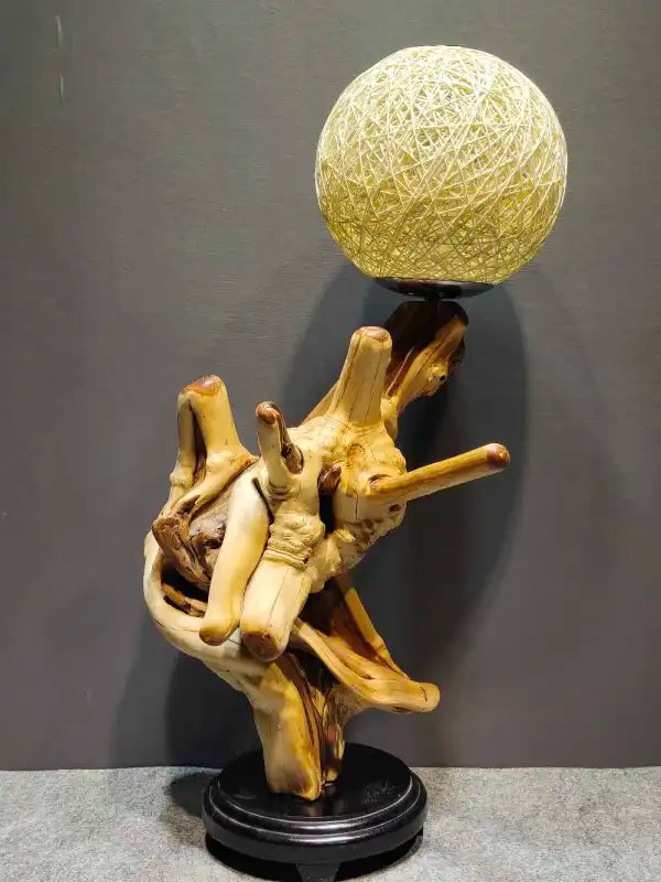 Cliff cypress lamp showing twisted root base detail