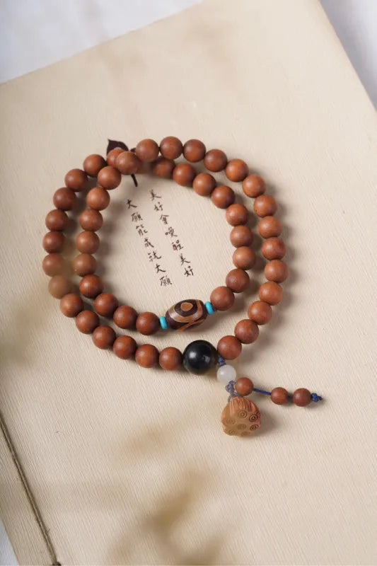 Sandalwood Mala Bracelet 36 Beads | Dzi Bead & Lotus Pod Charm | Wisdom, Protection & Blessing