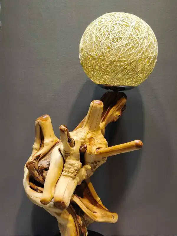 Cliff cypress root lamp top view showing rattan globe shade